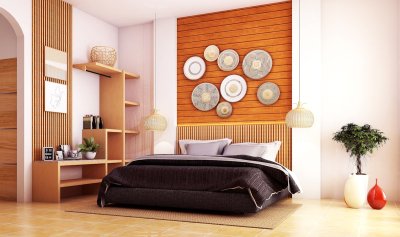 Aardse kleuren nemen de slaapkamer over van grijs en beige